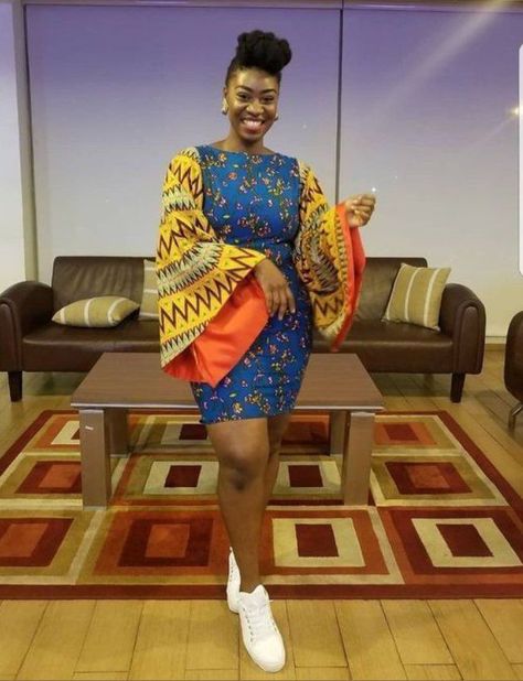 Ankara short flare gown with sneakers Short Gown Styles, Nigerian Fashion Ankara, Ankara Styles For Women, Ankara Short, Trendy Ankara Styles, Ankara Short Gown Styles, Ankara Gowns, Short African Dresses, Ankara Gown