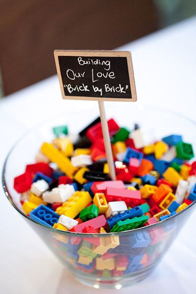 Lego-Themed Wedding Ideas | BridalGuide Modern Wedding Centerpieces, Kids Table Wedding, Lego Wedding, Brick By Brick, Boda Diy, Sisters Wedding, Simple Centerpieces, Wedding Activities, Wedding 2025