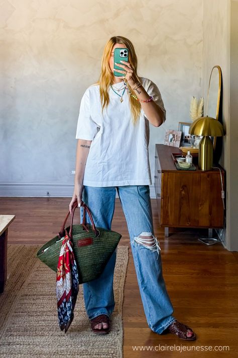 A classic white tshirt in an oversized fit is the easiest thing to style. This easy summer outfit idea is perfect for running errands, grabbing lunch with friends, or heading to the farmers market. These #targetfind jeans are my favorite and rival much more expensive brands. I paired it with a classic white t-shirt and my fav Sezane raffia basket bag. #frenchgirlfashion #whitetshirtoutfit #easyoutfitideas #widelegjeansoutfit #basketbag Big Shirt Big Pants Outfit, Big Pants Outfit, French Girl Fashion, White Tshirt Outfit, Easy Summer Outfit, Easy Outfit Ideas, Expensive Brands, Raffia Basket, Wide Leg Jeans Outfit