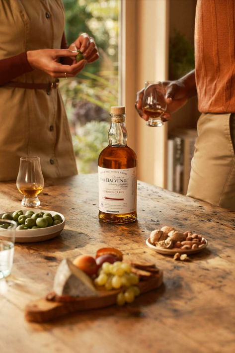 A man and a woman stand next to a wooden table on which sits a bottle of French Pineau Aged 18 Years single malt whisky along with olives, fruit, cheese, and nuts Distillery Photography, Speyside Scotland, Whisky Collection, Dont Drink And Drive, Food Drink Photography, Drinks Design, Natural Wine, Single Malt Whisky, Total Wine