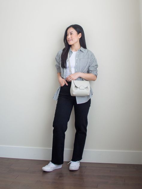 Sharon of Her Simple Sole is showcasing an outfit from her September outfit roundup, featuring a basic white bodysuit, a striped button up shirt, black straight leg jeans, an off-white crossbody bag and white sneakers | minimalist outfits | simple outfit ideas Parisa Wang, Petite Fashion Outfits, Simple Outfit Ideas, September Outfits, White Sneakers Outfit, Black Straight Leg Jeans, Minimalist Outfits, My September, Outfits Simple