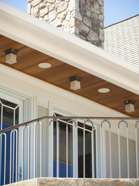 Audio Video Interiors carefully matched the wood stain of this porch to the outdoor, weatherproof in-ceiling speakers for an unobtrusive look. Outdoor Speakers Backyards, Porch Light Fixtures, Outdoor Technology, Media Room Design, Hgtv Dream Home, Ceiling Speakers, Outdoor Speakers, Technology Trends, House System