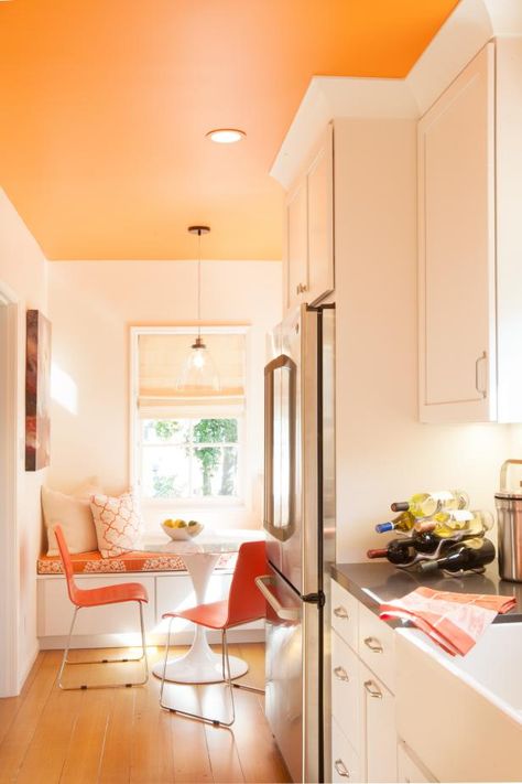 Orange Accent Walls, Bold Kitchen, Orange Rooms, 1920s House, Grey Countertops, Nordic Living Room, Orange Kitchen, Brown Kitchens, Wallpaper Home Decor