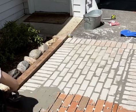 I wanted to add some curb appeal to our front steps, so I added some brick pavers over my existing concrete pathway...yes, that's right...OVER the existing sidewalk. Here is what our walkway looked like before...boring beat up concrete. First, I roughly laid out the brick pattern I would use. Then I mixed grout up in a bucket. Make sure to use exterior grade grout. Then I started to lay the grout with a thinly notched trowel. Then I put a small amount of grout on each brick and… Paver Sidewalk, How To Lay Pavers, Concrete Pathway, Epoxy Grout, Concrete Path, Asphalt Driveway, Concrete Cover, Concrete Walkway, Walkways Paths