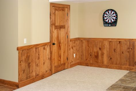 3 panel Knotty Pine interior door with 1x8 Tongue & Groove Knotty Pine wainscote and custom contemporary chair rail and baseboard. Pine Wainscoting, Shaker Style Interior, Shaker Interior Doors, Knotty Pine Doors, Shaker Style Interior Doors, Knotty Pine Walls, Pine Interior Doors, Beadboard Wainscoting, Interior Door Styles