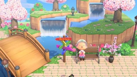 ACNH terraforming inspiration with waterfalls and a bridge right at the entrance of your island. #anch #terraforming #cherryblossom Acnh Waterfall, Waterfall Entrance, Acnh Terraforming, Animal Crossing Game, A Bridge, Park Slide, Animal Crossing, Baby Mobile, Entrance