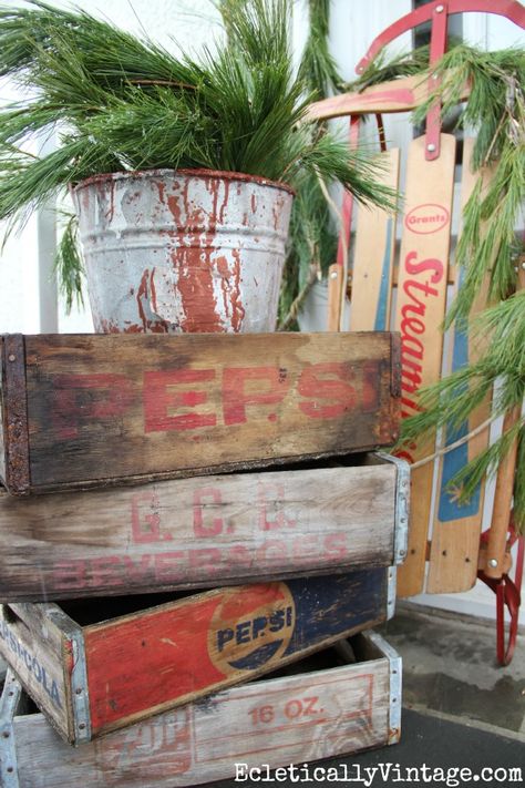 Vintage Pepsi crates on this beautiful winter porch kellyelko.com Winter Porch Decorating Ideas, Christmas House Tour, Retro Christmas Decorations, Porch Decorating Ideas, Winter Porch, Christmas Decorations Wreaths, Clock Vintage, Christmas Porch, Christmas Decorations Rustic