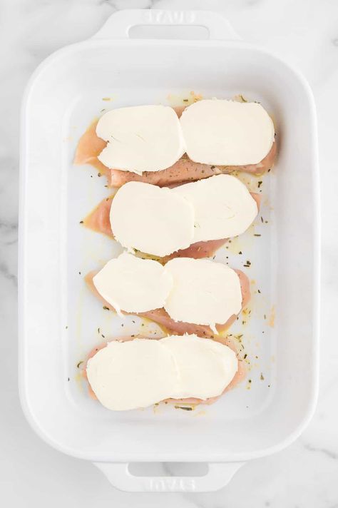 fresh slices of mozzarella on top of chicken breasts in a baking dish Baked Chicken With Mozzarella Cheese, Meals With Fresh Mozzarella, Fresh Sliced Mozzarella Recipes, Baked Mozzarella Chicken Rolls, Recipes With Fresh Mozzarella Slices, Chicken Fresh Mozzarella Recipes, Recipes With Sliced Mozzarella, Mozzarella Slices Recipes, Sliced Mozzarella Recipes