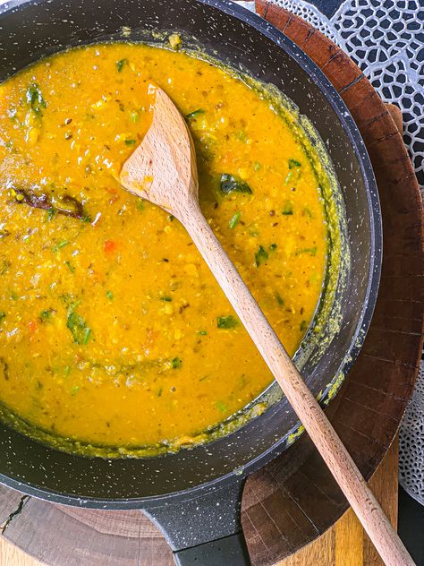 A simple, healthy split yellow lentil (daal) recipe prepared with aromatics, seasoned with tomatoes and garlic, and flavored with spiced oil known as Tadka. Lentil Dhal, Lentils Recipe, Toor Dal, Plain Rice, Yellow Lentils, Pigeon Peas, Fenugreek Leaves, Turmeric Powder, Lentil Recipes