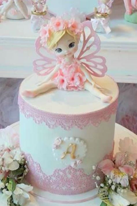 Take a look at this magical fairy birthday party! The birthday cake is so pretty! See more party ideas and share yours at CatchMyParty.com  #catchmyparty #partyideas #fairy #fairyparty #girlbirthdayparty Fairy Themed Cake 1st Birthdays, Fairy Theme Cake, Fairy Butterfly Birthday Cake, Fairy Birthday Cake Ideas, Fairy Birthday Cakes For Girls Kids, Fairy Cakes For Girls Birthday, Fairy Themed Cake, Fairy Theme Cake Girl Birthday, Fairy Cake Ideas