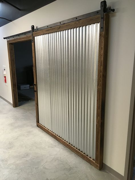 Corrugated metal and rough sawn ship-lapped wood sliding barn door Corrugated Metal Doors, Metal Shop Door, Bar Sliding Door, Corrugated Metal Interior Design, Metal Sliding Door Design Outdoor, Farm Doors Sliding, Metal Door Design Outdoor, Industrial Door Design, Corrugated Metal Projects