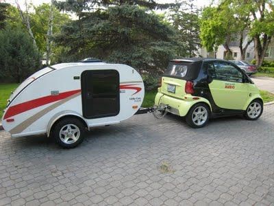 LOVE teardrop trailers, in fact this is something I lust after, it being light enough to be pulled by a motorcycle really makes me grin! Little Guy Teardrop Trailers: A small camper for the subccompact Small Car Trailer, Pull Behind Motorcycle Trailer, Small Trailers, Smart Cars, Small Camper, Motorcycle Camping Gear, Rv Travel Trailers, Travel Trailer Camping, Tiny Camper