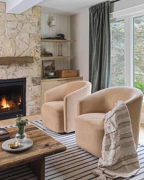 Creating a cozy corner of comfort ✨ The caramel velvet swivel chairs add that touch of luxe, perfectly paired with the warmth of the stone fireplace and the soft wood millwork. This family room is all about layering textures that invite you to stay a while. Who wouldn’t want to curl up here with a good book and a cup of tea? 🍂 Design : @rume.design Contractor: @cresmark_design_build Photography: @arnalphotography #InteriorDesign #CozySpaces #DesignDetails #RumeDesign” Cozy Fireplace Seating, Fireplace Chairs, Fireplace Chair, Fireplace Furniture, Tea Design, Swivel Chairs, Cozy Fireplace, A Cup Of Tea, Stone Fireplace