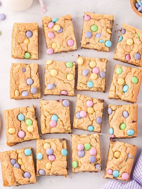 Overhead shot of squares of cookie bars with m&m on top and some around it, a cloth, and a cup of milk. Easter Cookie Bars, Easy Easter Cookies, Mild Taco Seasoning, Swedish Meatballs Easy, Refrigerated Cookie Dough, Chocolate Chip Cookie Mix, Sugar Cookie Mix, Easter Snacks, Easter Cookie