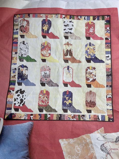 This is a charming quilt kit to make a quilt of pieced cowboy boots designed by Tina Schuman in 2000.  The kit produces a top that measures 37 1/2" x 40 1/2" but you could easily make it larger with your own western stash. The pattern and instructions are included. I purchased this kit at Quilt Festival in Houston in 2000 and have not personally seen it elsewhere. Unused mint condition that has been carefully stored. Horse Quilt Patterns, Vintage Quilt Patterns, Cowboy Quilt, Western Quilts, Vintage Quilts Patterns, Horse Quilt, Make A Quilt, Cowboy Horse, Boots Patterns