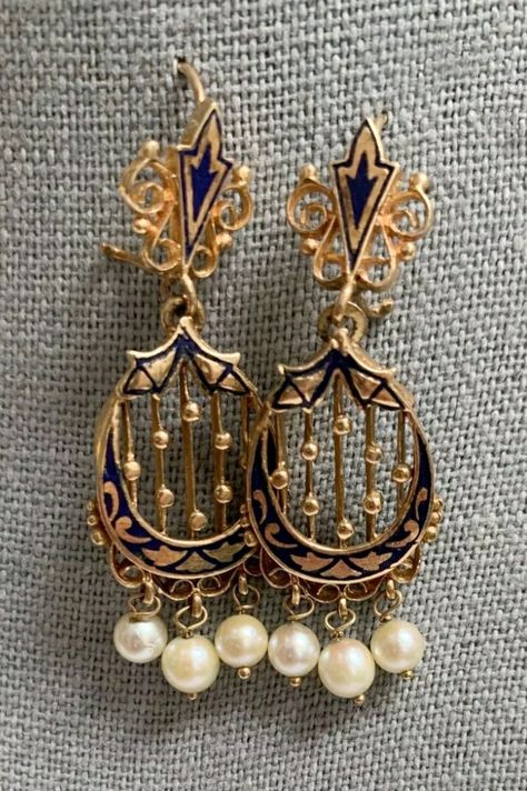 Pair of 14K gold yellow gold antique dangle earrings w/closed hook closures ~ 8.60 Grams total weight Lovely Design and Condition. Marked 14K yellow gold pair of vintage pierced earrings. The earrings have an enamel design. Saltwater cultured pearls attached in a dangle style. The pair of earrings come in a quality earring box. You can feel secure knowing that the pair of 14K yellow gold pearl and enamel earrings were professionally graded and inspected by a Graduate Gemologist credentialed by the Gemological Institute of America (GIA). Egyptian Earrings, Gold Jewellry, Pearl Vintage, Earring Box, Enamel Earrings, Fantasy Jewelry, Gold Enamel, Pierced Earrings, Product Photos