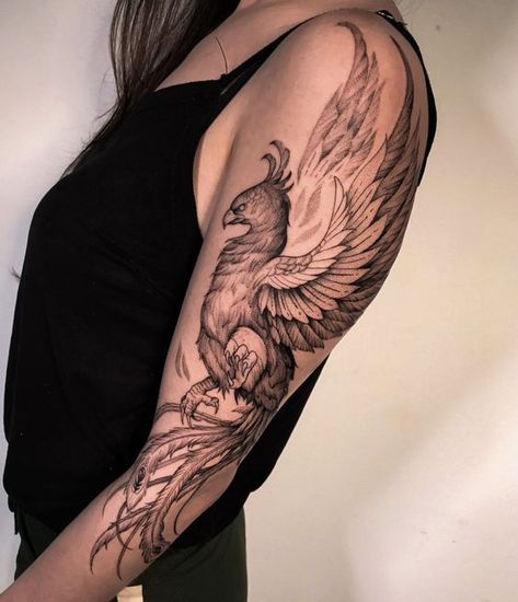 Find 57 completely unique, exclusive, and eye-catching phoenix tattoo designs in our article. Bonus: all explained meanings. Phoenix Tattoo Blackwork, Phoenix Tattoos For Women, Phoenix Tattoo Arm, Feniks Tattoo, Tattoo Brazo Mujer, Phoenix Tattoo Sleeve, Phönix Tattoo, Arm Sleeve Tattoos For Women, Phoenix Tattoos