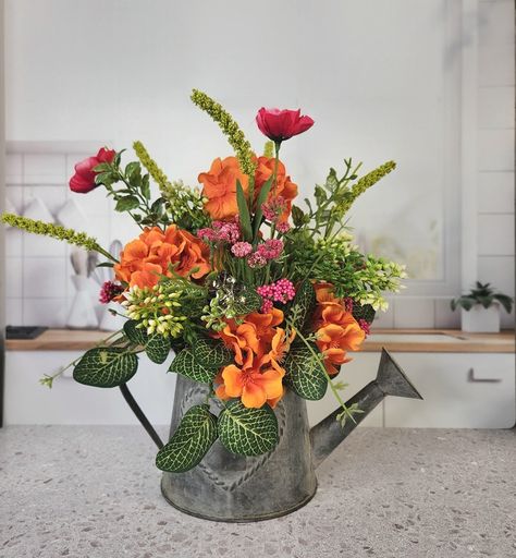 New to the shop and Teacher Appreciation Week starts Monday!😉 This sweet watering can is filed with sunshine!!! The orange and pink combo is divine!!!🧡🩷 It's also perfect for Mother's Day, your home office, your kitchen....anywhere you could use a little more happiness. #giftideas #smallflowerarrangement #artificialflowers #friendshipgift #teacherappreciationweek #teacherthankyougifts #vabbd ##vablackchamberofcommerce Artificial Flower Centerpieces, Small Flower Arrangements, Fall Grapevine Wreaths, Flower Centerpiece, Pink Poppies, Summer Home, Summer Home Decor, Orange And Pink, Artificial Flower Arrangements