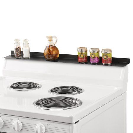 Instant Range Magnetic Top Shelf Perfect to Instantly Add Extra Storage or Display Space Description Now you can instantly add valuable storage space above your stove with this handy shelf. Available in three colors to fit any dcor, the shelf is magnetic on the bottom to stay in place on stovetops. It's perfect for holding spices, oils and more and easily wipes clean. Stainless steel. 30"L x 3 1/2"W. Choose: Black, Stainless Steel or White. Item can only be shipped to the 48 contiguous United St Spice Shelf, Spice Rack Organiser, Stainless Steel Cleaning, Collections Etc, Top Shelf, Spice Rack, Spice Jars, Kitchen Shelves, Extra Storage