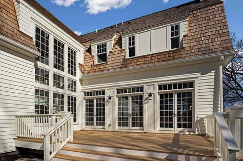 Beautiful dutch gambrel shingle-style lake cottage in Minnesota Grand Manor Shingles, Gambrel Exterior, Stone Siding Exterior, Scottish Cottages, Modern Mediterranean Homes, Siding Ideas, Dutch Style, Ranch Exterior, Gambrel Roof