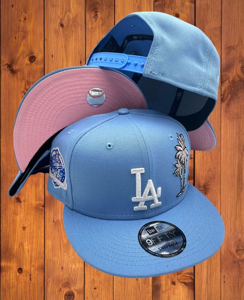 Los Angeles Dodgers New Era Sky Blue/Pink Bottom With 50TH Anniversary Patch On Side 9FIFTY Adjustable Snapback Hat. #Losangeles #Dodgers #MLB La Hat Pink, Mlb Hats, Blue Cap Outfit, Snapback Hat, Yankee Fitted, Streetwear Hats, Swag Hats, Custom Fitted Hats, Cute Caps