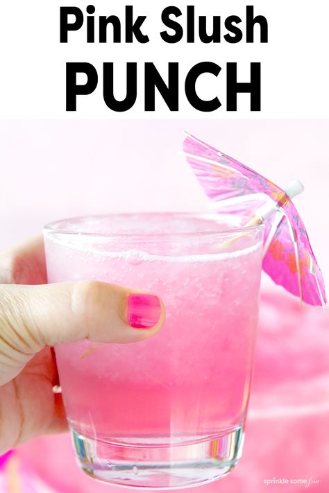 Pink punch in a glass cup with a bright pink drink umbrella. Slush Punch Recipes Non Alcoholic, Pink Slushy Punch, Mermaid Punch For Kids, Slush Punch, Pink Party Punches, 18th Party, Dinosaur Christmas Tree, Football Watch Party, Simple Holiday Gifts