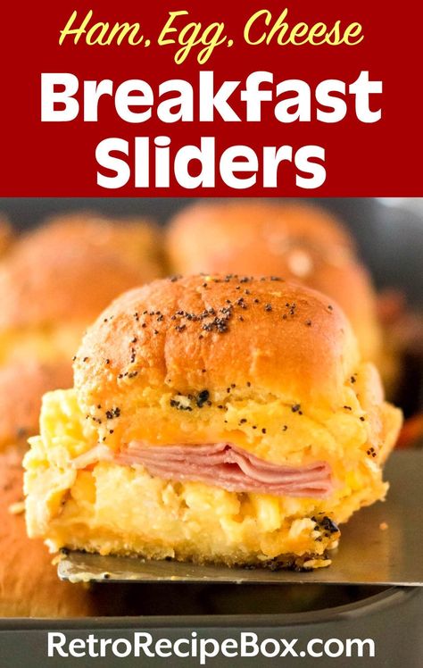 Easy Ham, Egg and Cheese Breakfast Sliders are delicious little sandwiches made by layering Hawaiian rolls, savory ham slices, sliced melty cheese, scrambled eggs and topped with a sauce of seasonings and melted butter. This is the perfect recipe for quick egg breakfast sliders on the go. retrorecipebox.com, breakfast ideas, slider recipes Quick Egg Breakfast, Breakfast Sliders Hawaiian Rolls, Cheese Scrambled Eggs, Hawaiian Bread Rolls, Airfryer Breakfast, Ham Slices, Eggs Cheese Breakfast, Breakfast Sliders, Ham Sliders