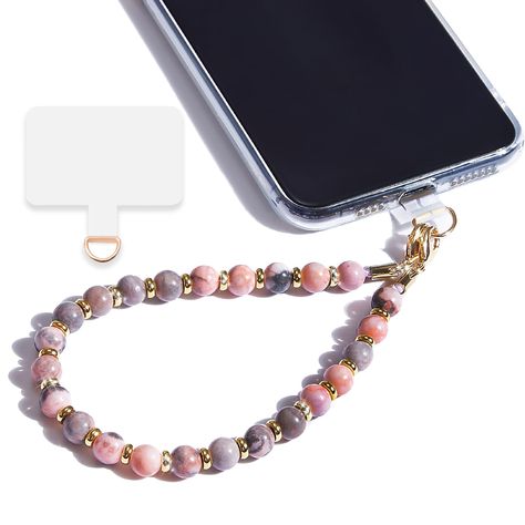 PRICES MAY VARY. Unique Design: Our phone wrist strap is crafted from pure natural stone beads, meticulously strung with durable thread and accented with 14K real gold electroplated metal between gemstones.Phone strap wrist ensures your phone stays secure yet easily accessible—a perfect solution for those needing quick phone access while keeping hands free. Multi-Functional: The wristlet for phone includes a versatile tether tab compatible with 90% of phone cases. Whether you're out clubbing, at Iphone Bracelet, Phone Bracelet, Phone Wrist Strap, Beaded Designs, Phone Wristlet, Fashion Beads, Natural Stone Beads, Phone Strap, Seashell Crafts