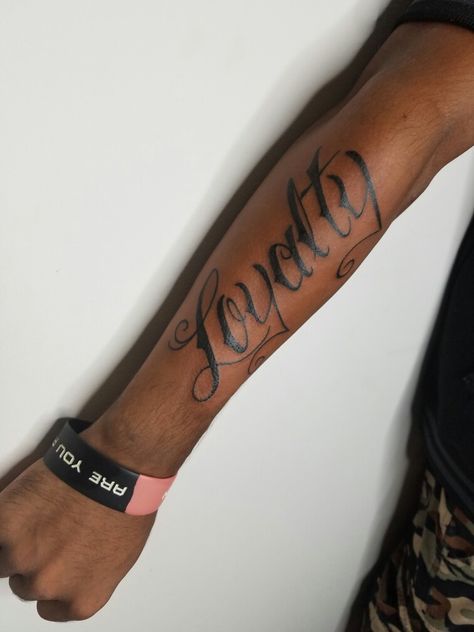 Loyalty tattoo Tattoo Ideas For Men First Time, Loyalty Tattoo For Men, First Time Tattoos, Loyalty Tattoo, Tattoo Lettering Styles, Warrior Tattoos, Tattoos For Black Skin, Hand Tattoos For Guys, Tattoo Sleeve Men