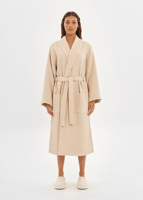 Indulge in a luxurious and cozy experience with our waffle bathrobe. Made from 100% cotton, in a small wafle pattern that gives the fabric texture with softness and fluidity. The lightweight material allows for easy movement, while the belted waist and relaxed silhouette offer a stylish and comfortable fit. Ideal for lounging at home or slipping on after a shower, this waffle bathrobe is a must-have for any relaxation ritual Cotton Set, Fabric Texture, Harmful Chemicals, Corporate Gifts, Chemicals, Waffles, Comfort Fit, Lounge Wear, Relaxed Fit