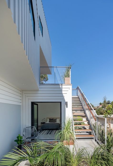 Doors, Swing Door Type, Exterior, and Metal Accessed via a separate entry, the second-level ADU can be used as an office, fourth bedroom, or a suite for a possible tenant. Photo 7 of 115 in Best Doors Metal Photos from Stacked Boxes Form an Experimental Hillside House David Chipperfield Architects, French Oak Flooring, Hillside House, Exterior Stairs, Accessory Dwelling Unit, Granny Flat, Exterior Cladding, Level Homes, Los Angeles Homes