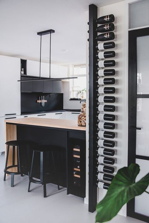 33+ Sophisticated Black Kitchen Cabinets to Inspire Your Next Remodel 32 Kitchen Wall Design, Modern Wine Rack, Home Wine Cellars, Black Kitchen Cabinets, Home Bar Designs, Black Kitchen, Wine Room, Black Kitchens, Bars For Home