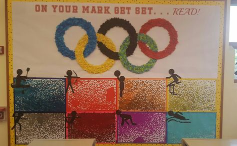 Summer reading Olympic bulletin board. Kids add a sticker for every book they read! Library Thanksgiving, Olympic Bulletin Board, Read A Thon, Reading Display, Library Bulletin Board, Reading Bulletin Boards, Olympic Theme, Library Book Displays, Library Bulletin Boards