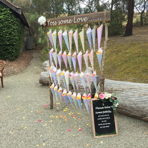 Ceremonies I Do set up this gorgeous toss some love rose petal stand. Otter Wedding, Wedding Ceremony Stage, Wedding Confetti Toss, Petal Toss Wedding, Blue Reception, Wedding Suggestions, Petal Toss, Wedding Ceremony Unity, Diy Wedding Video