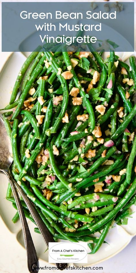 Here’s a simple, rustic vegetable salad with French country flair that’s the perfect side dish with whatever you’re grilling this summer! Green Bean Salad with Mustard Vinaigrette and crunchy walnuts is easy to make and comes together quickly! Serve warm or cold. Green Beans With Walnuts Recipe, Easy Green Salad Recipes Simple, Roasted Green Bean Salad, String Bean Salad Recipes, Green Salad Recipes For Dinner Side, Marinated Green Bean Salad, Green Bean Recipes Salad, French Bean Salad, Raw Green Bean Salad