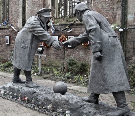 This is a statue by Andy Edwards entitled “All Together Now” which for the next few days will be on display in St Luke’s, Liverpool’s famous “bombed out church”. The figures are about to shake hands standing over a football which relates to the time that British and German soldiers paused, apparently to play football on Christmas Day 1914. The hands do not quite meet which allows one to place a hand between them, joining the act of all too brief sanity on that day. The figures will leave Li.... Christmas Truce, All Together Now, St Luke, Liverpool History, Memorial Statues, Liverpool Home, Saint Luke, Liverpool City, Public Sculpture