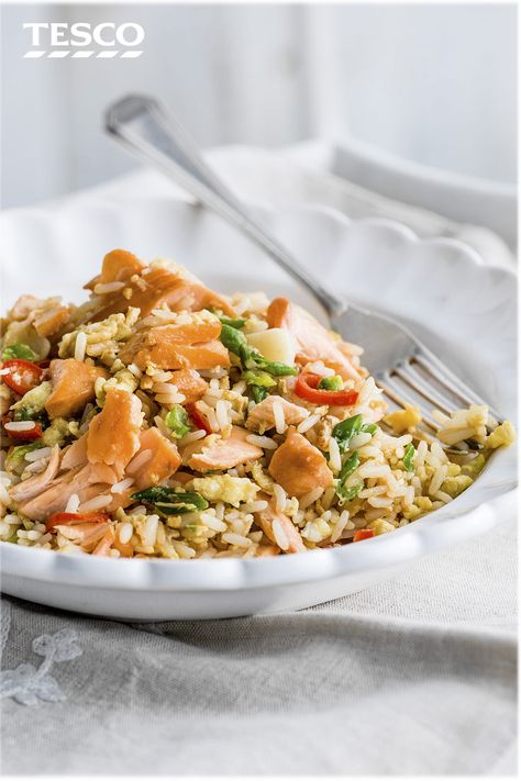 Learn how to cook egg fried rice (with a delicious salmon twist) with our easy recipe. Quick, healthy and loaded with Chinese-inspired flavours, it’s a great midweek dinner idea. | Tesco Salmon Fried Rice, Rice Salmon, Egg Fried Rice Recipe, Egg Fried Rice, Salmon Eggs, Easy Chicken Breast, Tesco Real Food, Easy Salmon Recipes, Salmon And Rice