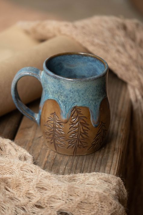 Handmade mug decorated with sgraffito design - OOAK and filled with love! This cup is of a sand colored clay body, decorated and made functional with a beautiful vibrant blue glaze.  These cups are not dishwasher- or microwave safe. Tall Ceramic Mug, Pottery Cups Ideas, Ceramic Cups Ideas, Clay Mugs Ideas, Mug Ceramic Ideas, Ceramics Mug Ideas, Pottery Designs Painted, Ceramic Mugs Ideas, Western Ceramics