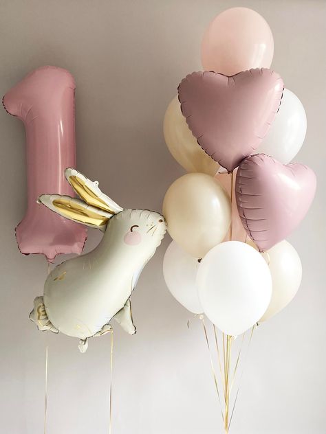 Celebrate in style with our Elegant Bunny and Heart Balloons Set, designed to add a touch of grace and whimsy to any event. This set features a charming bunny balloon in a soft, muted color palette, complete with adorable detailing and a hint of gold. Accompanied by heart-shaped balloons in harmonizing shades of pastel pink and classic white, this set is perfect for Birthdays Set Includes: 1 PCS - 32 Inches Number Balloon 1 PCS - 31 Inches Rabbit Balloon 2 PCS - 18 Inches Light Pink Hearts Ballo Bunny Balloon Garland, Dog Balloon Bouquet, Ballerina Bunny Birthday Party, Some Bunny Is One Birthday Decorations, Some Bunny Is Turning One Decorations, Bunny Balloon Arch, Spring Birthday Theme, Pastel Themed Birthday Party Decorations, Somebunny Is One Birthday