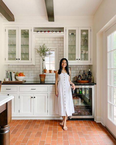 Patti on Instagram: ““Oh that’s different?” “There’s a reason why people don’t install terra cotta tile floors in the midwest.” I guess if we would’ve…” Divided Living Room, Terracotta Tiles Kitchen, Narrow Living Room, Terracotta Floor, Black Countertops, Glass Front Cabinets, Large Kitchen Island, Terracotta Tiles, Living Room Flooring