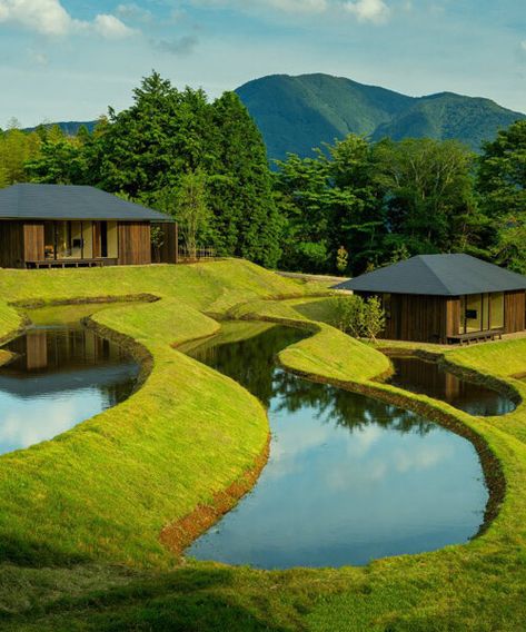 kengo kuma scatters hot spring hotel across sculpted rice terraces Water Hotel, Terraced Landscaping, Spring In Japan, Outdoor Baths, Hanalei Bay, Kengo Kuma, Rice Terraces, Clear Blue Sky, Hot Spring