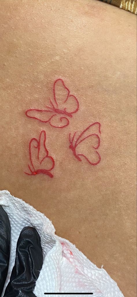 Cute Red Ink Tattoos Small, Small Red Tattoos Black Women, Tattoo Ideas Female Red Ink Butterfly, Simple Red Butterfly Tattoo, Red Ink Tattoos Ribcage, Mini Red Tattoos For Women, Red And Black Small Tattoo, Red Tattoos For Women Quotes, Red Foot Tattoos For Women