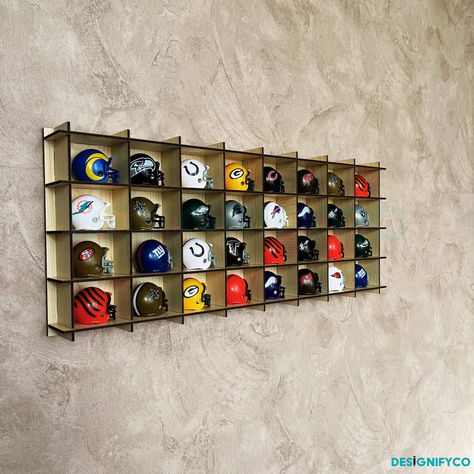 NHL Mini Helmets Collection Shelf 💙You can display 32 and an additional 8 mini helmets on your shelf  💙You can mount it on the wall or use it as a stand on the table. 💙💙Also; Remember that we make custom production and we can produce your dream shelf for you. We are ready to answer all your questions. Introducing our specially crafted NHL Mini Helmets Collection Shelf from Designifyco, tailored for hockey enthusiasts and collectors. This unique shelf is constructed from high-quality 3mm MDF material, ensuring durability and a long-lasting showcase for your prized collection. Key Features: 12 Color Options: This shelf comes in 12 different color options, allowing you to customize it according to the style of your collection and the decor of your room. Durable MDF Material: The shelf is Mini Helmet Display Ideas, Hockey Puck Display, Helmet Display, Collection Shelf, Golf Ball Display Case, Unique Shelf, Golf Ball Displays, Funko Pop Display, Unique Shelves