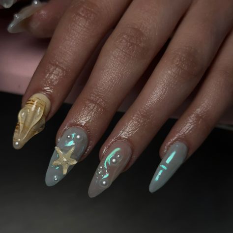 Seashell inspired nails💞 #denvernailtech #fortcollinsnailtech #feed #viral #almondnails #seashellnails #beachnails #summernails #shellnails #auranails #chrome #starfish #starnails #starfishnails #nailinspo #feedfeed #now #july Seashell Inspired Nails, 3d Starfish Nails, Starfish Nail Art, Starfish Nails, Fish Nails, Ocean Nails, Seashell Nails, Cruise Nails, Sea Nails