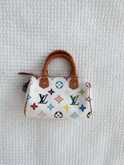 Monogram multicolor vintage mini speedy Mukarami X Louis Vuitton hand bag in white.
Y2K style, hand bag, summer fashion. Louis Vuitton Murakami Bags, Louis Vuitton Takashi Murakami Bags, Vintage Louis Vuitton Bag, Murakami Louis Vuitton, Takashi Murakami Louis Vuitton, Louis Vuitton Mini Bag, Louis Vuitton Murakami, Purse Aesthetic, Elliana Walmsley