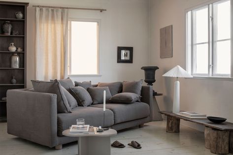 This moody wabi sabi livingroom in a sparse earthy palette creates a sophisticated backdrop for the statement making IKEA Stockholm 2017 sofa. The boxy lines are softened by the scattering of cushions and luxe Cocoa Brera Lino linen Bemz cover. Strike a balance between classic and contemporary forms and crisp monochromes to get the look. Stocksund Sofa, Stockholm 2017, Replacement Furniture Legs, Ektorp Sofa, Ikea Stockholm, Large Cushion Covers, Earthy Palette, Grey Couch, Headboard Cover