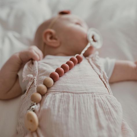 teeethies~handmade baby goods’s Instagram photo: “pretty in pink ✨💗🌸🎀⁣ ⁣ ronnie is looking so cute in our scottie pacifier clip! 🥰 grab one today and never lose your babes binky again! ⁣” Custom Pacifier, Soother Holder, Blush And Grey, Toxic Free, Dummy Clips, Pacifier Clip, Baby Design, Baby Name, Kids Branding