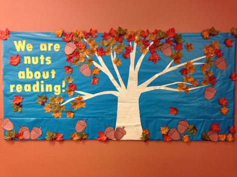 November Bulletin-- We're nuts about reading Bulletin Boards Elementary, November Bulletin Board Ideas, Library Bulletin Board Ideas, Fall Library Displays, Library Windows, November Bulletin Board, School Library Book Displays, February Bulletin Boards, October Bulletin Boards