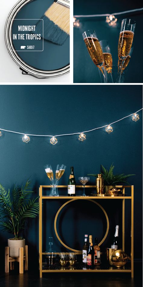 Your New Year’s Eve party wouldn’t be complete without the rich blue hue of Midnight In The Tropics by BEHR Paint. This elegant paint color adds a vintage style to the interior design of your home. Use a chic gold bar cart, string lights, and a navy velvet chair to complete this retro look. Click here for more home entertaining inspiration. Elegant Paint Colors, Kitchen Apartment, Behr Paint, Trendy Living Rooms, Front Door Colors, Bedroom Paint Colors, Trendy Bedroom, Bedroom Paint, Door Color