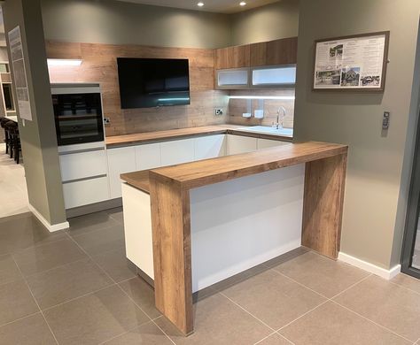 Breakfast Bar Added To Counter, Kitchen Half Island Ideas, White Kitchen Breakfast Bar, Kitchen Ideas With Bar Layout, Adding Breakfast Bar To Counter, Split Level Breakfast Bar, Breakfast Bar Extension Counter Tops, Breakfast Island Kitchen, Kitchen Ideas With Breakfast Bar